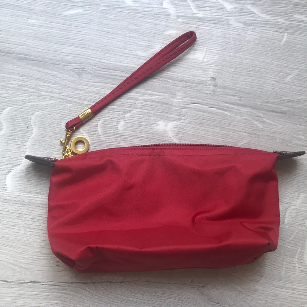 NWOT Red wristlet with gold metal accents